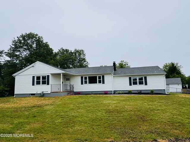 776 Elton Adelphia Rd, Freehold, NJ 07728 - ranch-style home with a front yard and roof with shingles