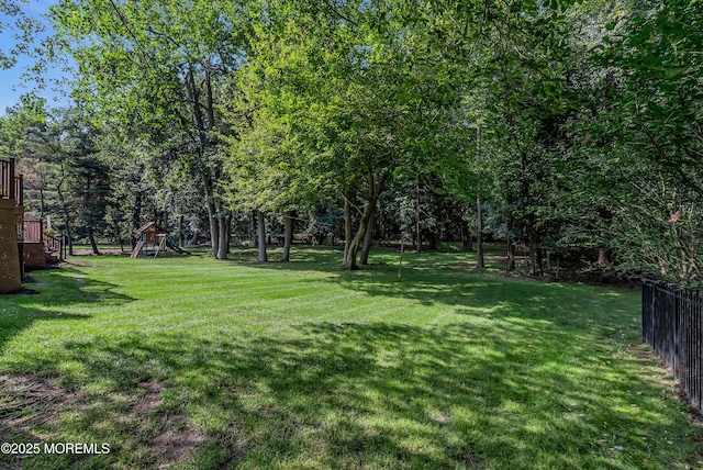 view of yard with a playground