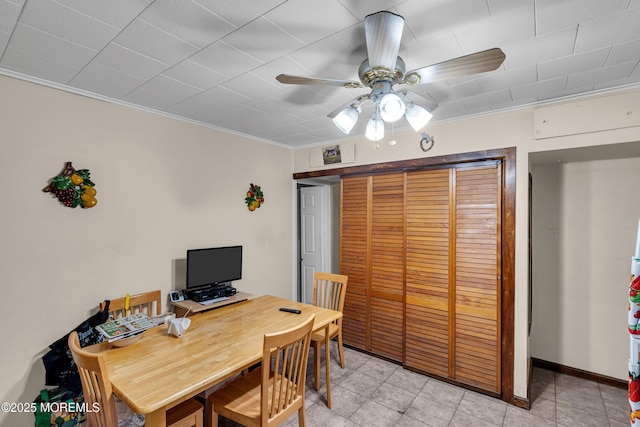 office featuring ornamental molding and ceiling fan