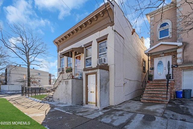 view of front facade with cooling unit