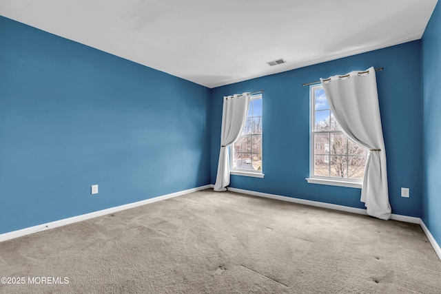 empty room with carpet flooring