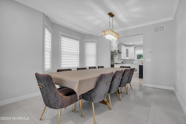 tiled dining area with ornamental molding