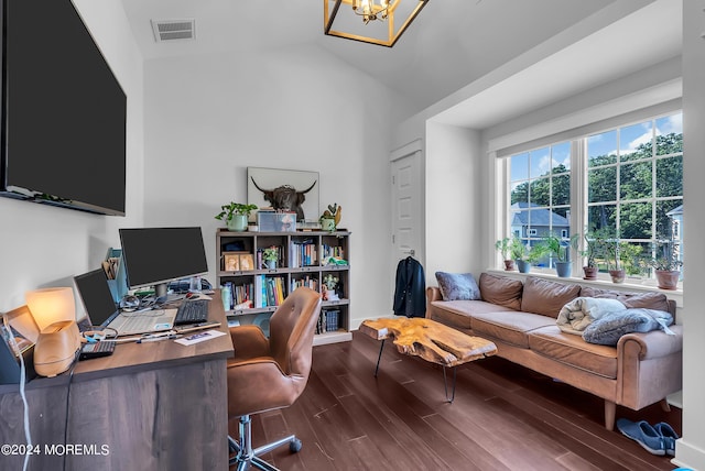 office space with wood-type flooring, vaulted ceiling, and an inviting chandelier