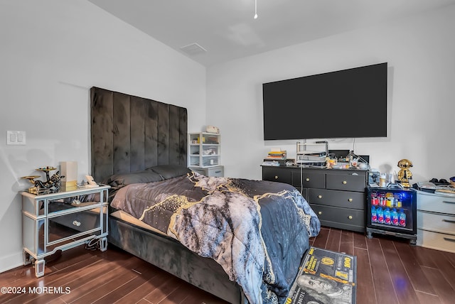 bedroom featuring dark hardwood / wood-style flooring