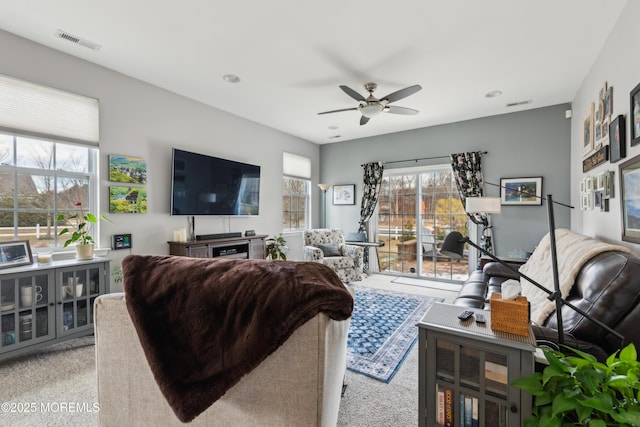 living room with ceiling fan