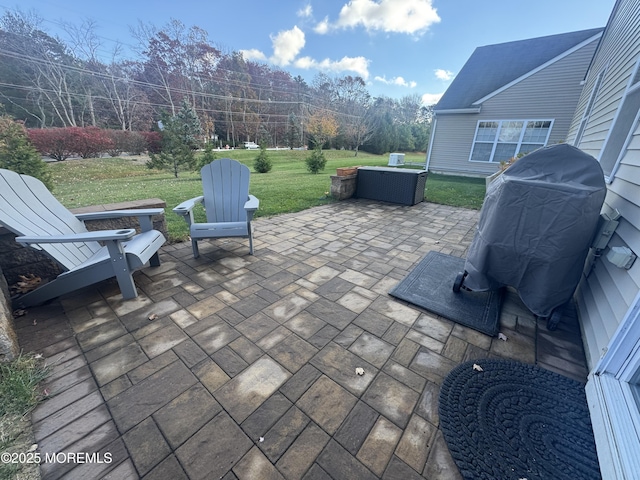 view of patio with a grill