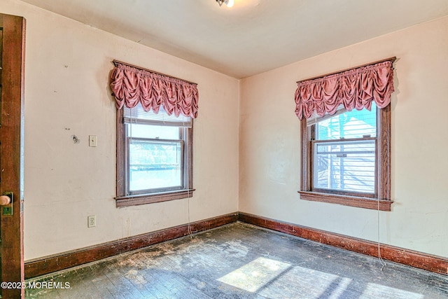 spare room featuring a wealth of natural light