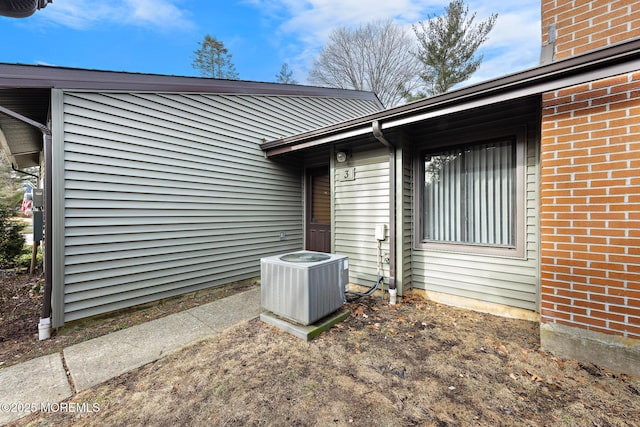 property entrance featuring cooling unit