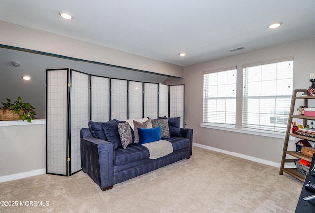 living room with light colored carpet