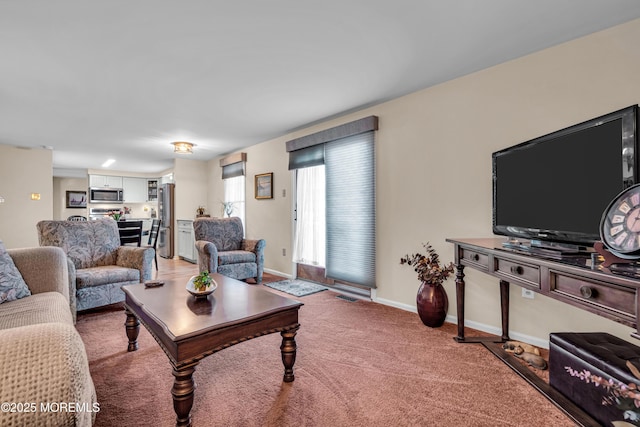 living room with light colored carpet