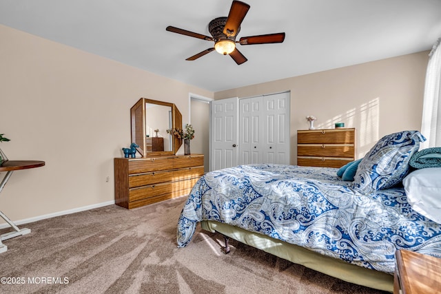 bedroom featuring carpet floors, a closet, and ceiling fan