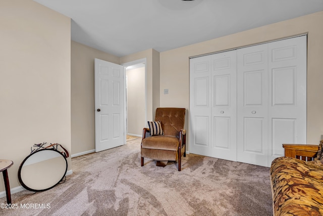 living area with light carpet