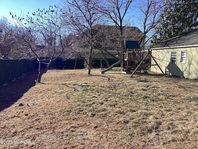 view of yard with a playground