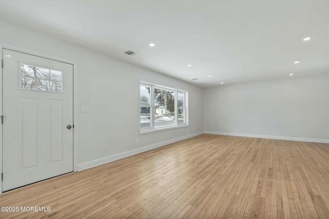 entrance foyer with light hardwood / wood-style flooring