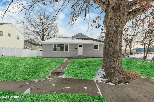 view of front of home with a front yard