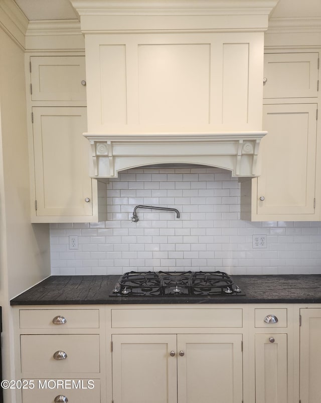 kitchen featuring black gas cooktop, decorative backsplash, open shelves, and crown molding