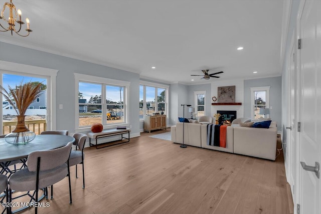 302 Reef Ct, Forked River, NJ 08731 - living room with crown molding, light wood-style floors, plenty of natural light, ceiling fan, and recessed lighting