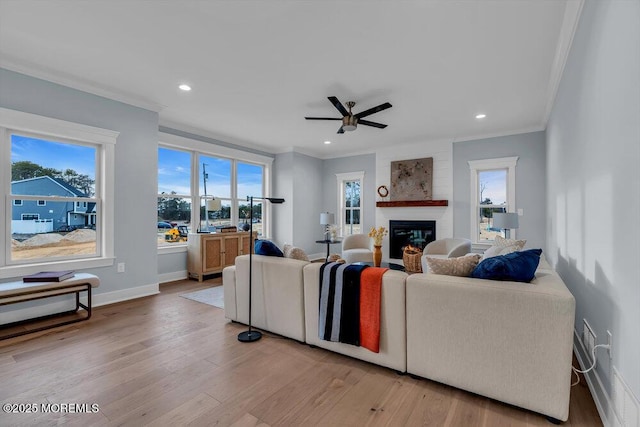 302 Reef Ct, Forked River, NJ 08731 - living area with ornamental molding, healthy amount of natural light, ceiling fan, light wood-style floors, and recessed lighting