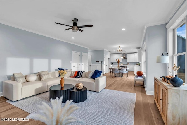 302 Reef Ct, Forked River, NJ 08731 - living area featuring recessed lighting, crown molding, light wood-type flooring, a chandelier, and ceiling fan