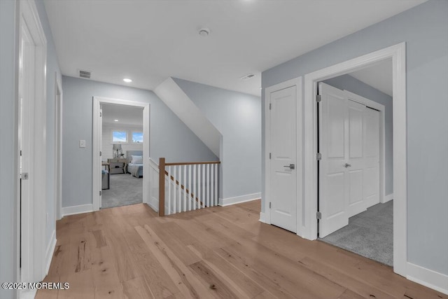 302 Reef Ct, Forked River, NJ 08731 - hall featuring an upstairs landing, light wood-type flooring, and recessed lighting