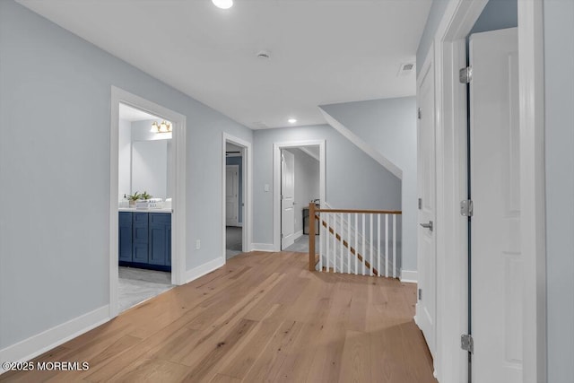 302 Reef Ct, Forked River, NJ 08731 - hall featuring an upstairs landing, light wood-type flooring, and recessed lighting