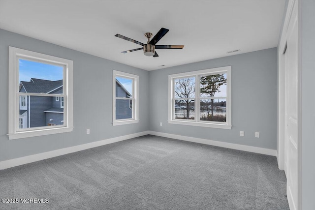 302 Reef Ct, Forked River, NJ 08731 - spare room with carpet floors and a ceiling fan