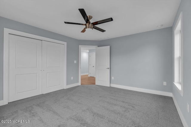 302 Reef Ct, Forked River, NJ 08731 - unfurnished bedroom with carpet flooring, a closet, and ceiling fan