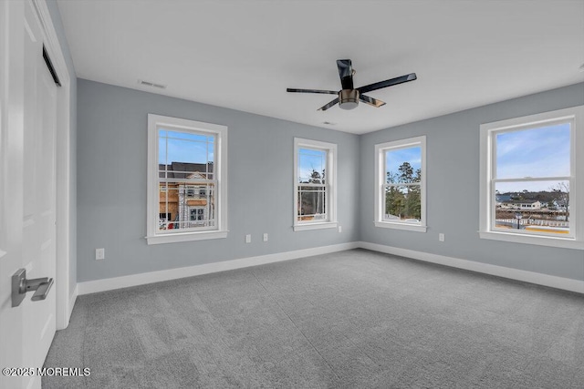 302 Reef Ct, Forked River, NJ 08731 - spare room with plenty of natural light, a ceiling fan, and carpet flooring