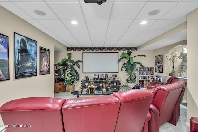 cinema room with a drop ceiling