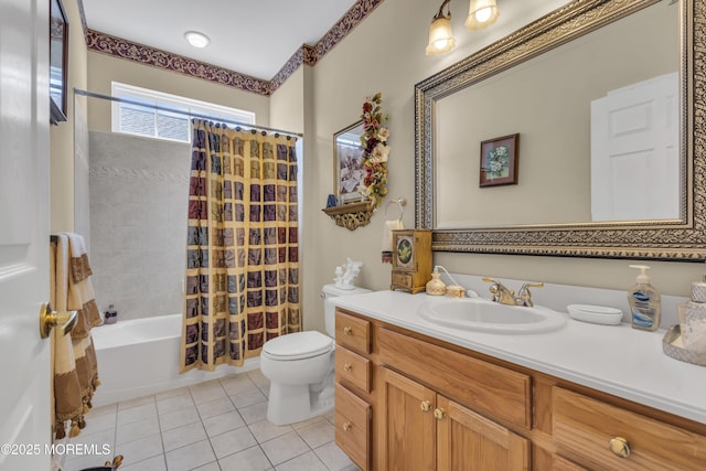 full bathroom with vanity, tile patterned floors, toilet, and shower / bath combo