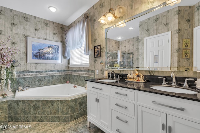 bathroom with vanity, tile patterned floors, and plus walk in shower