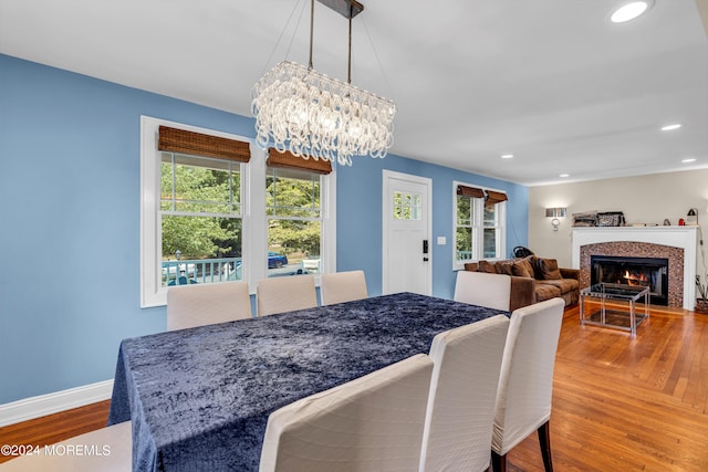 dining room featuring an inviting chandelier and plenty of natural light