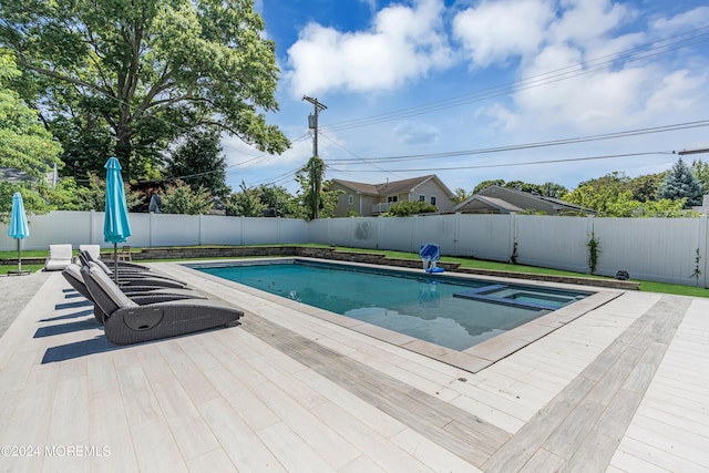 view of pool featuring a deck