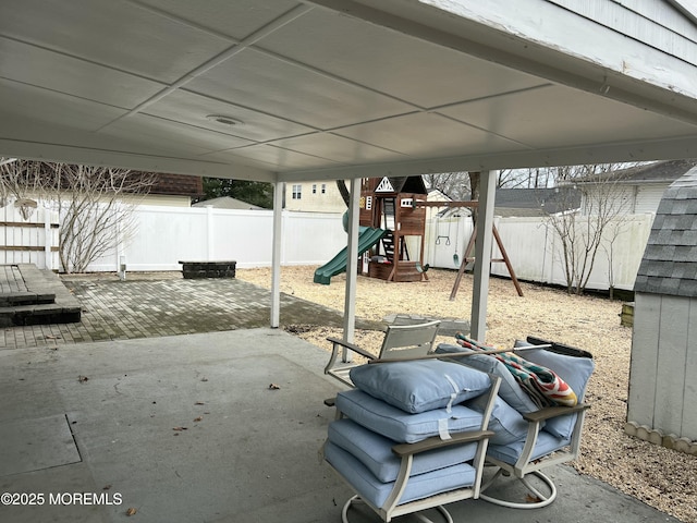 view of patio with a playground