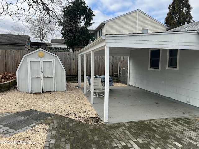 view of patio / terrace with a storage unit