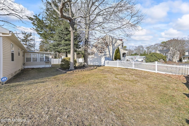 view of yard with a sunroom