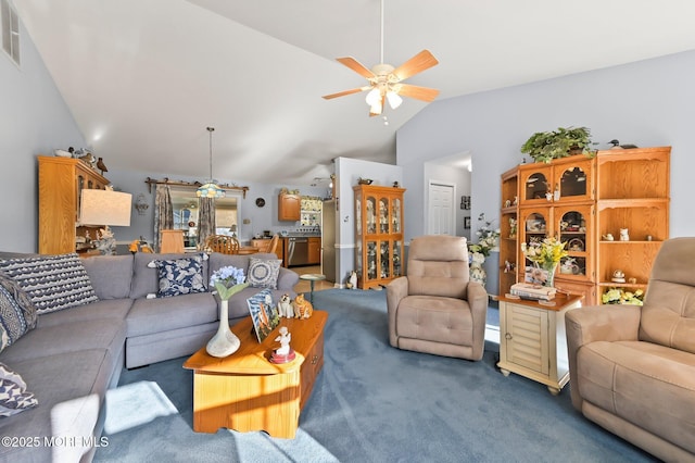 carpeted living room featuring vaulted ceiling and ceiling fan