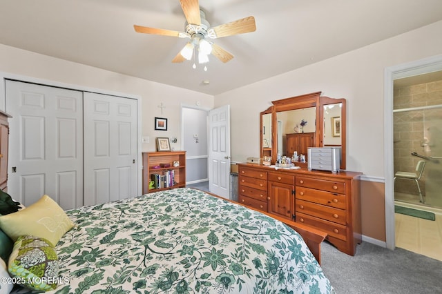 bedroom featuring ensuite bath, carpet flooring, ceiling fan, and a closet