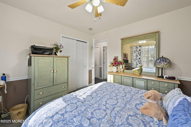 bedroom featuring ceiling fan and a closet