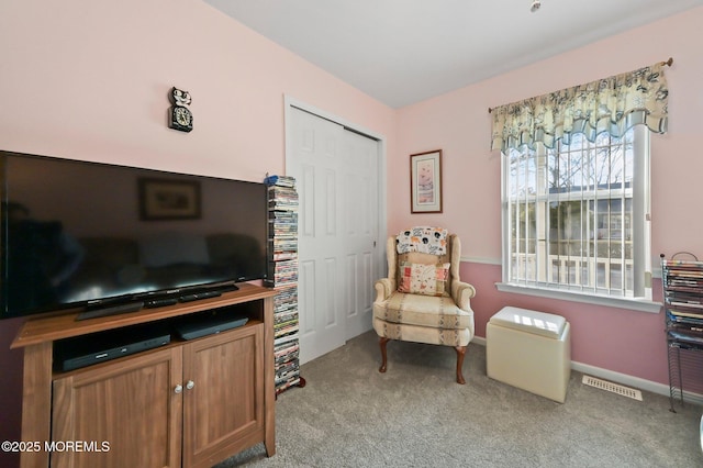 sitting room with light carpet