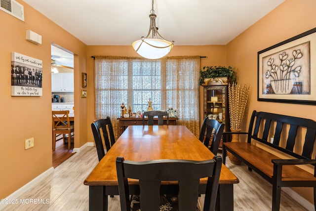 dining room featuring light wood-type flooring