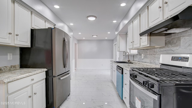 kitchen featuring a sink, stainless steel appliances, white cabinets, under cabinet range hood, and marble finish floor