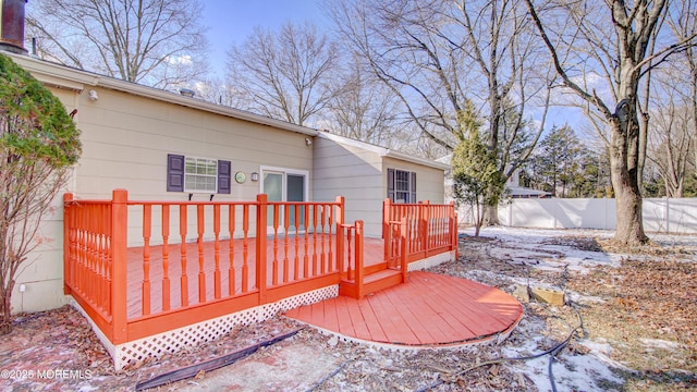 view of snow covered deck