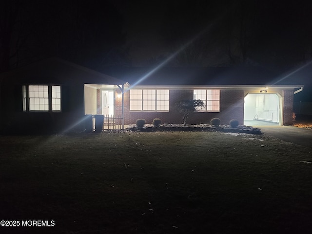 view of front of house with brick siding