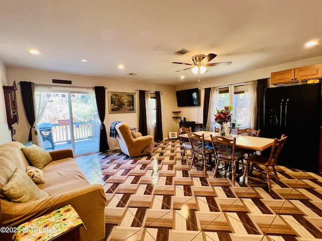 dining room with ceiling fan