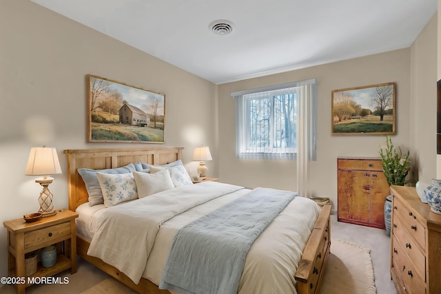 bedroom with light carpet