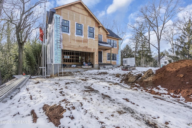 view of snow covered property