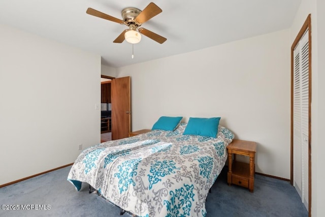 carpeted bedroom featuring a closet and ceiling fan