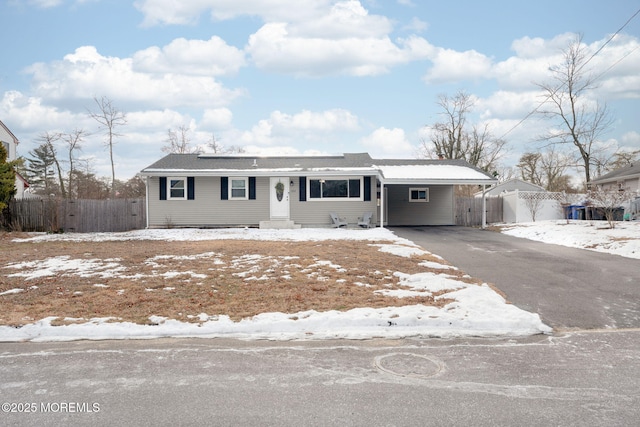 view of front of house with a carport