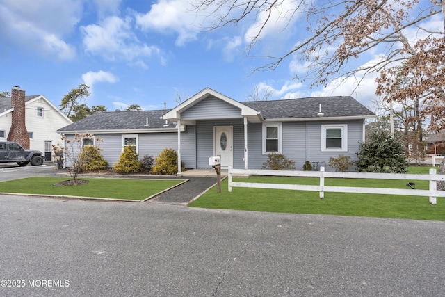 view of front of home featuring a front yard